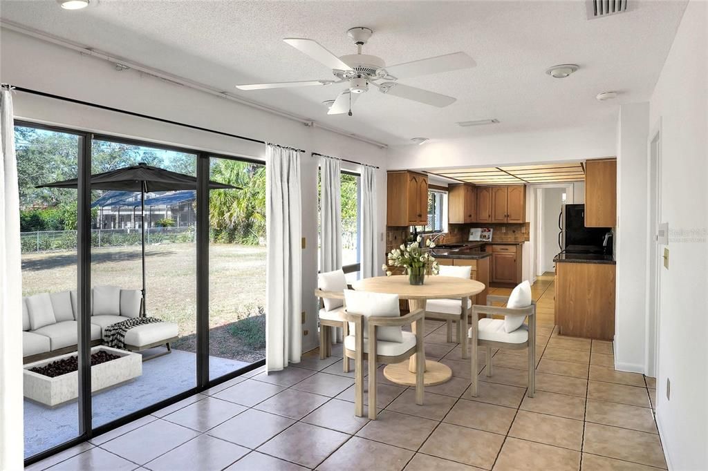 Virtually staged for casual dining with light streaming in, convenient to the kitchen