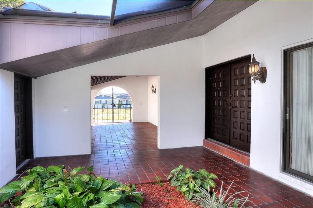 Atrium at the front door, with door to bonus room on opposite side