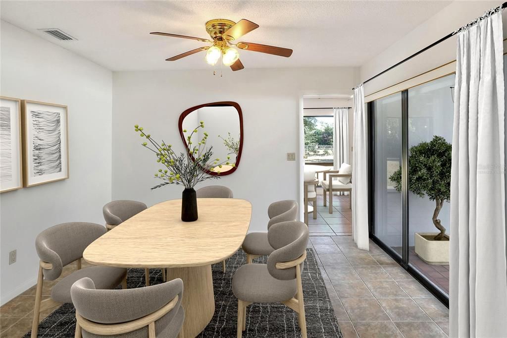 Virtually staged dining room off the atrium with view of tile mural