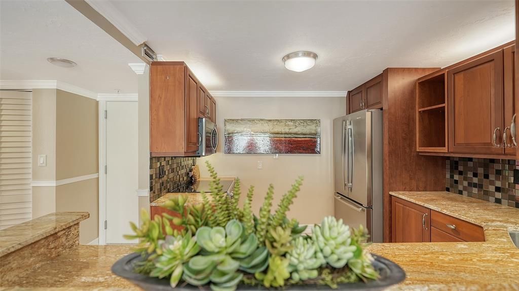 Wood cabinetry in large kitchen