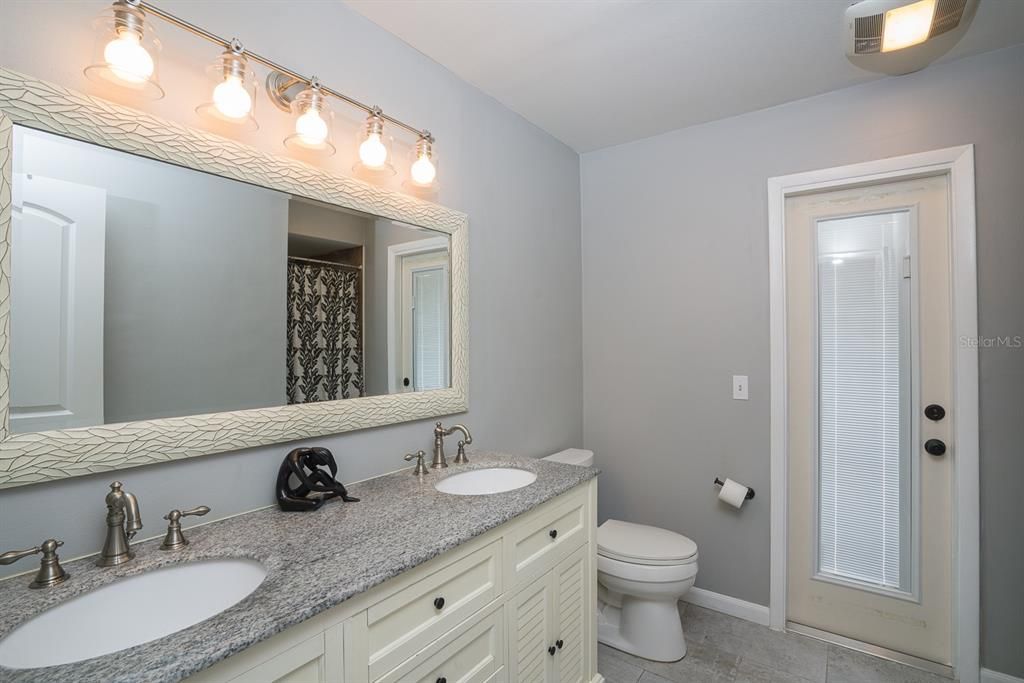 Spacious Master Bath W/ Door to the Pool Area