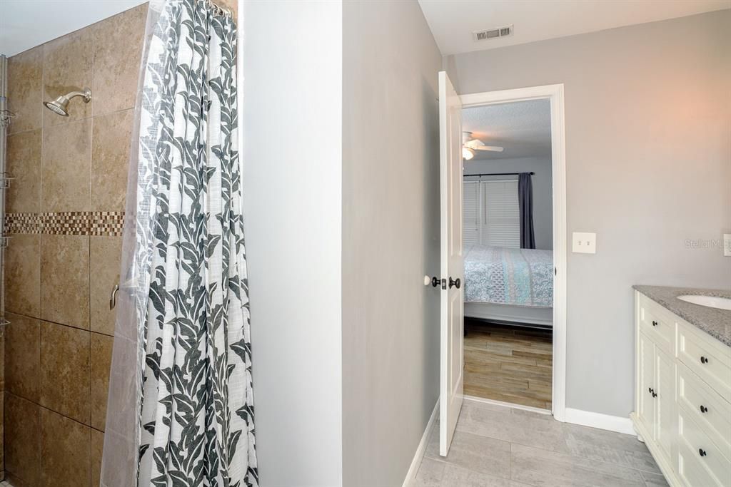 Walk-In Shower & Dual Sinks W/Granite Top