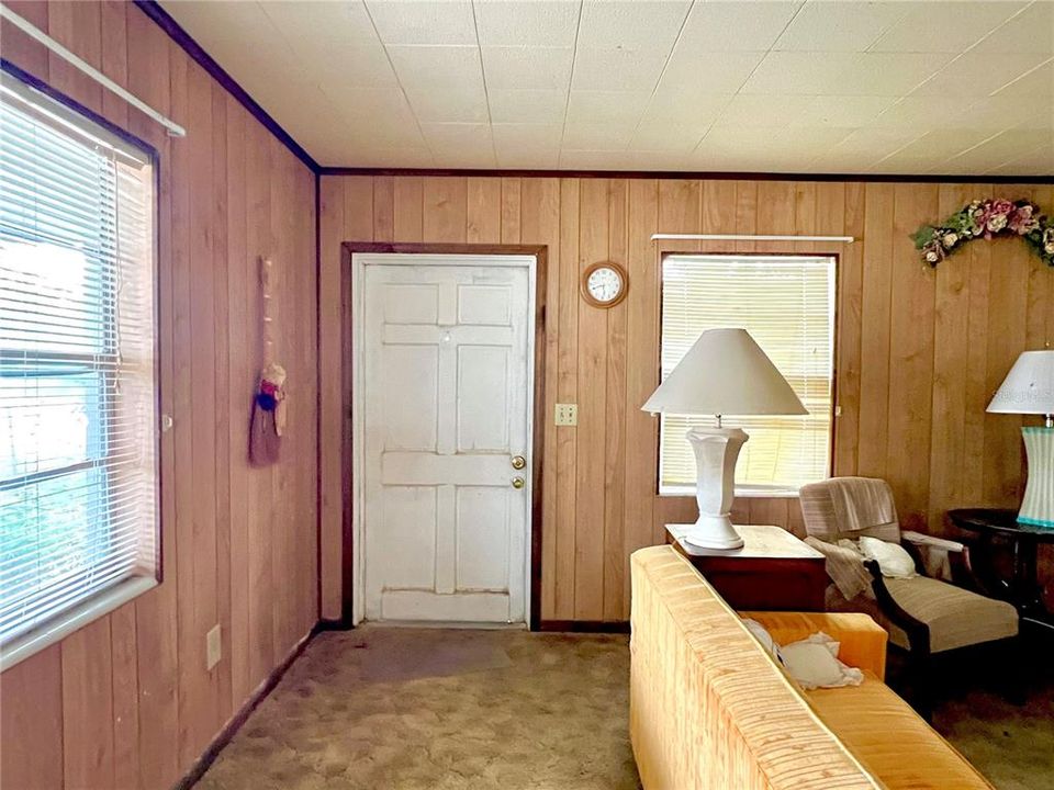 Front door entrance into spacious living room