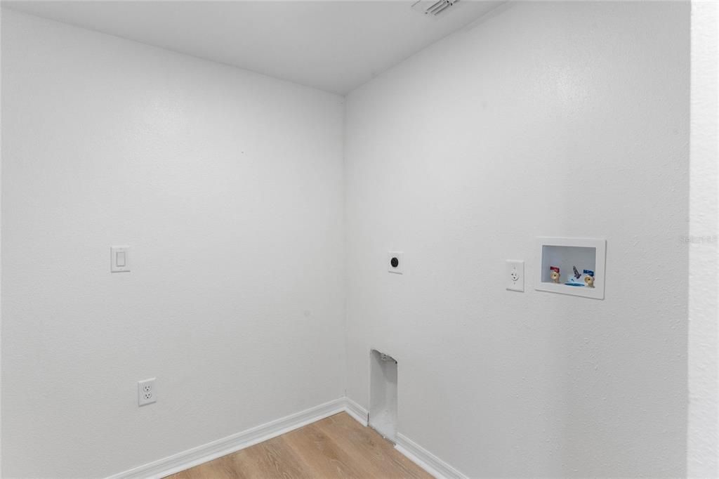 Laundry room, off the garage.