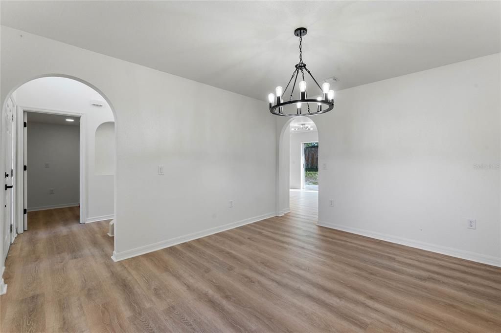 Dining room, to the right is your kitchen and to the left is your front door and stairs.