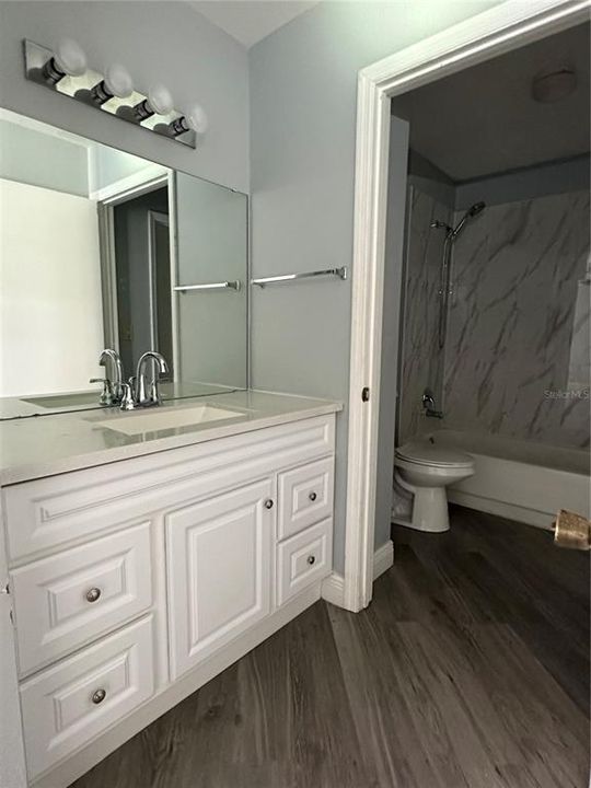 Large vanity area in back bedroom