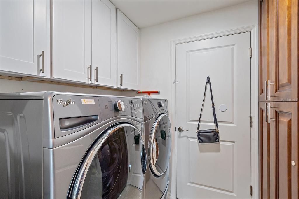 high-end washer and dryer in utility room