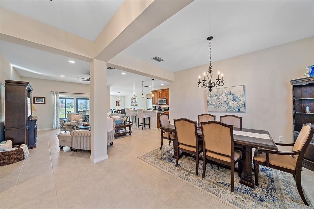 view from foyer & dining area to open living space