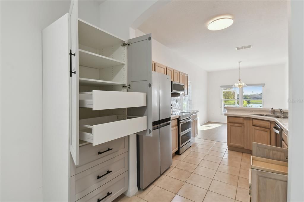 PANTRY CABINET WITH ROLL OUT DRAWERS