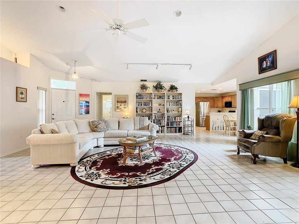 This home boasts a large 24’ x 29’ living room with 2 sets of sliding glass doors opening to the Florida Room.