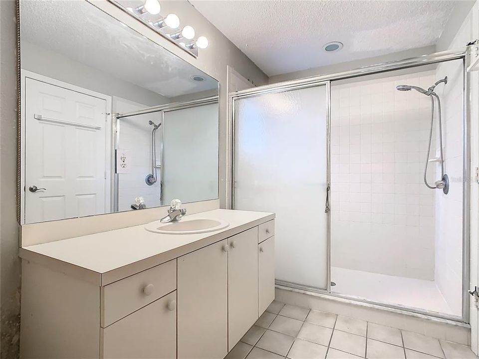 Primary bathroom has a walk-in shower.