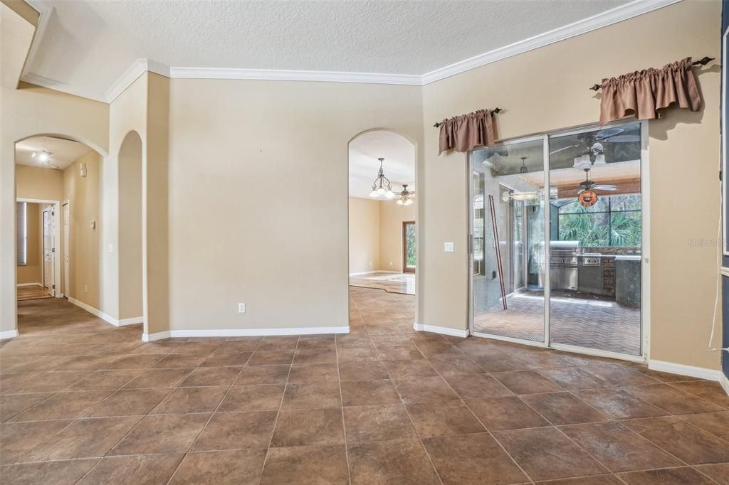 Living area with view into the breakfast room