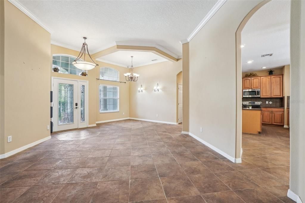 Tiled living/dining area at the entrance of the home