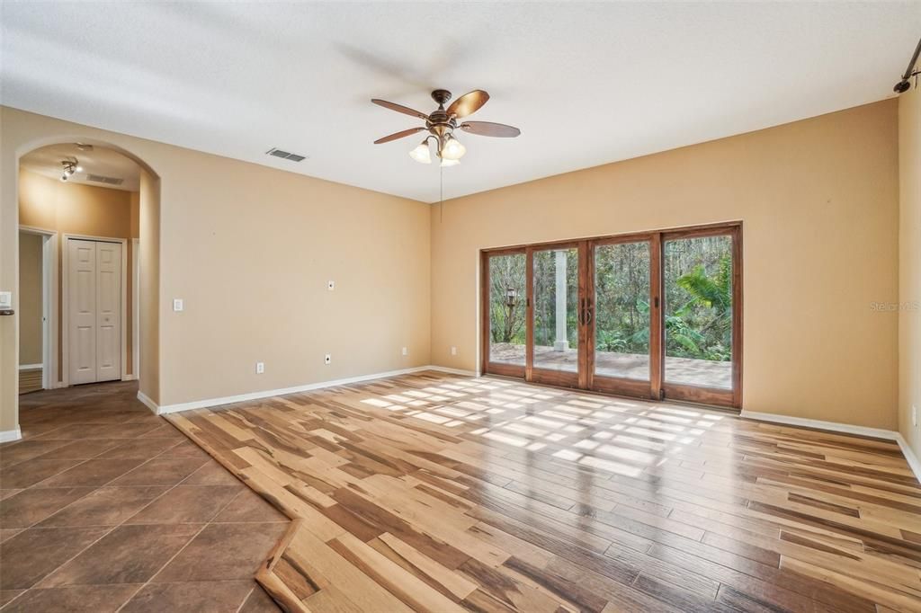 Family room with view of entrance into private bedroom 4