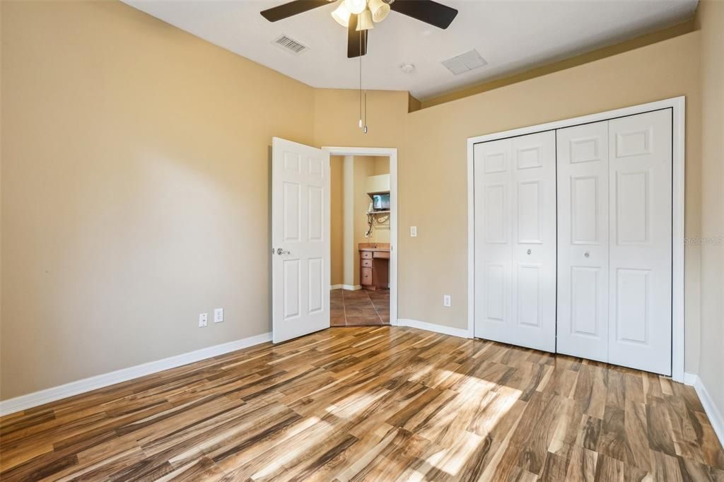 Bedroom 4 with nearby built in desk perfect for a home office or study area