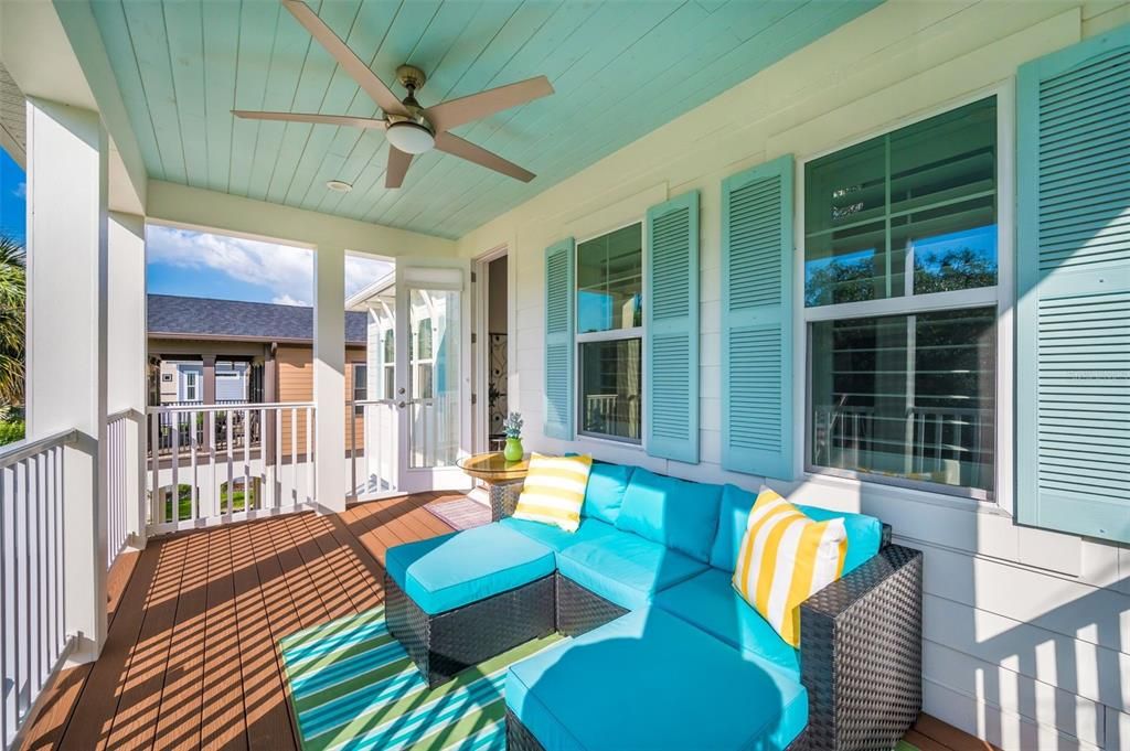 upstairs balcony also has composite decking and plank ceiling