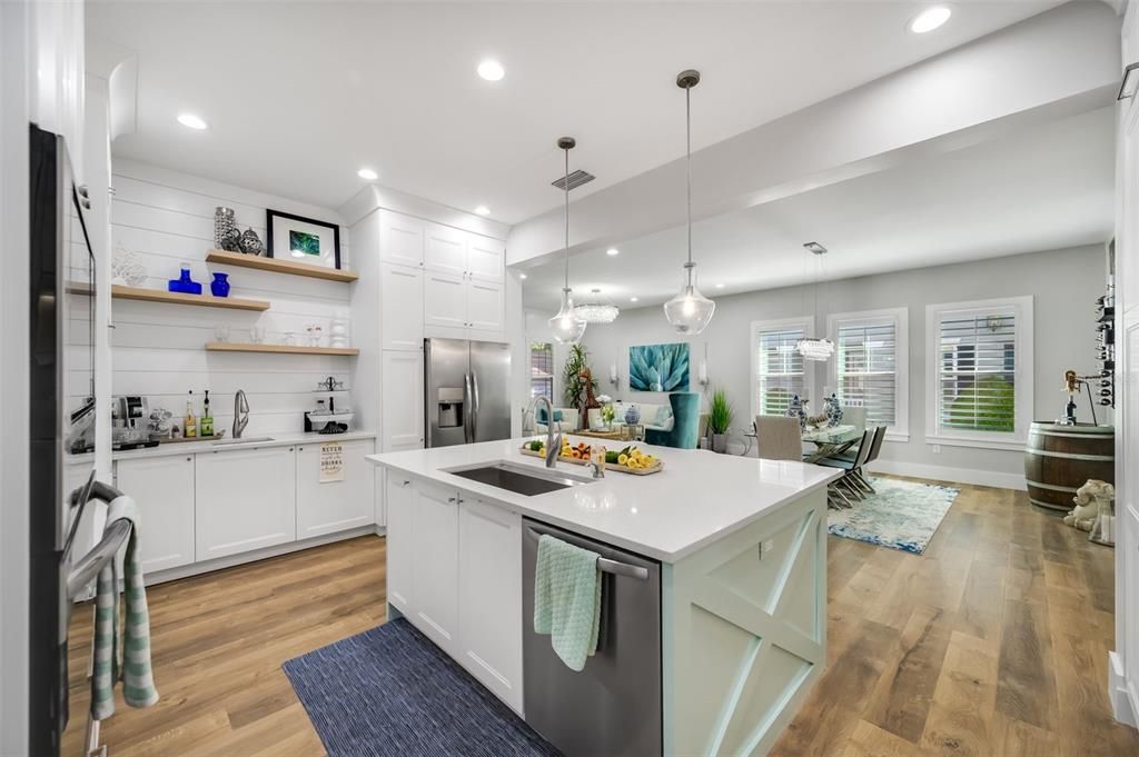 kitchen has hand made custom island with underside LED lighting