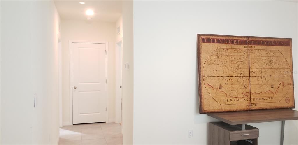 Hallway to guest bedrooms & bathroom