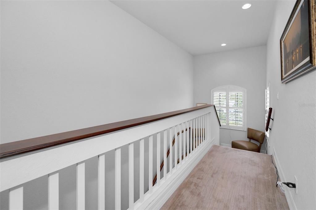 Primary Bedroom is so roomy with a magnificent crown molding & tray ceiling