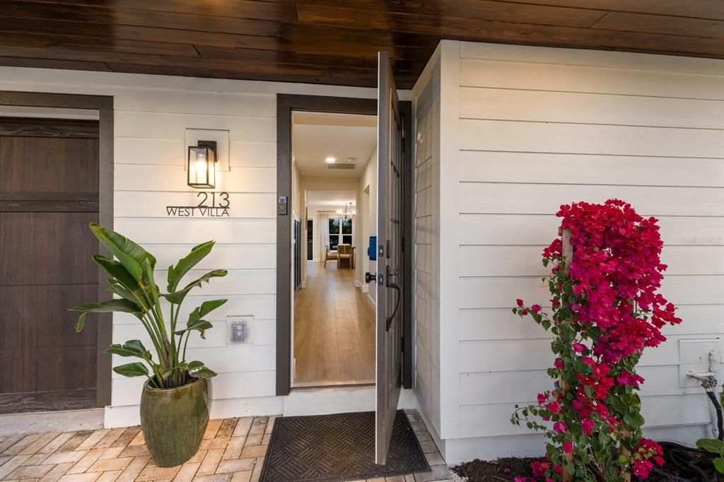 Custom front door, garage door and wood work above the entrance area.