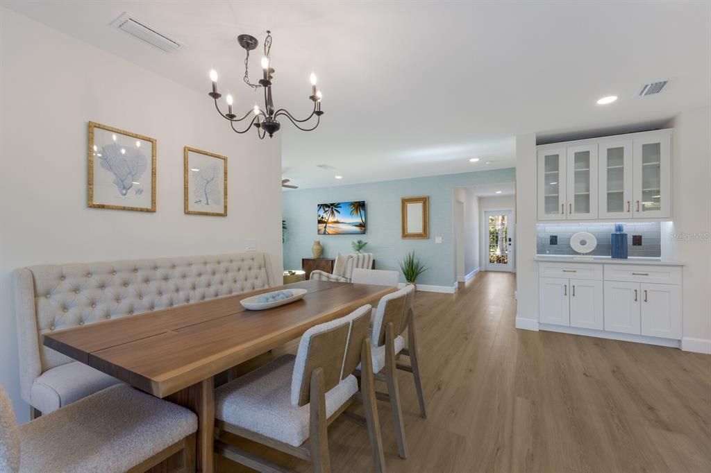 Dining room opens up to the kitchen w/ dry bar area