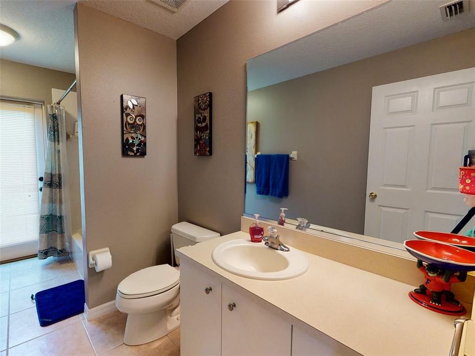 Guest bathroom with pool access first floor