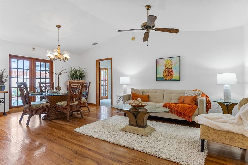 Hardwood Floors make an elegant statement in the formal Living and Dining Room