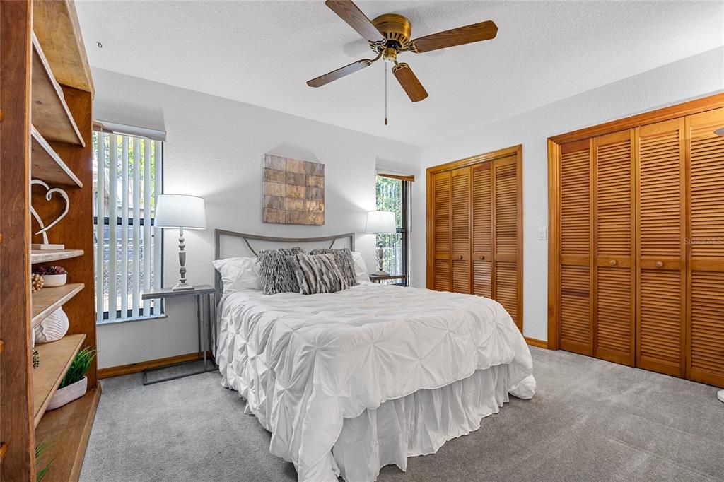 Bedroom #2 has a full wall of closets and two windows to allow lots of natural light if you wish