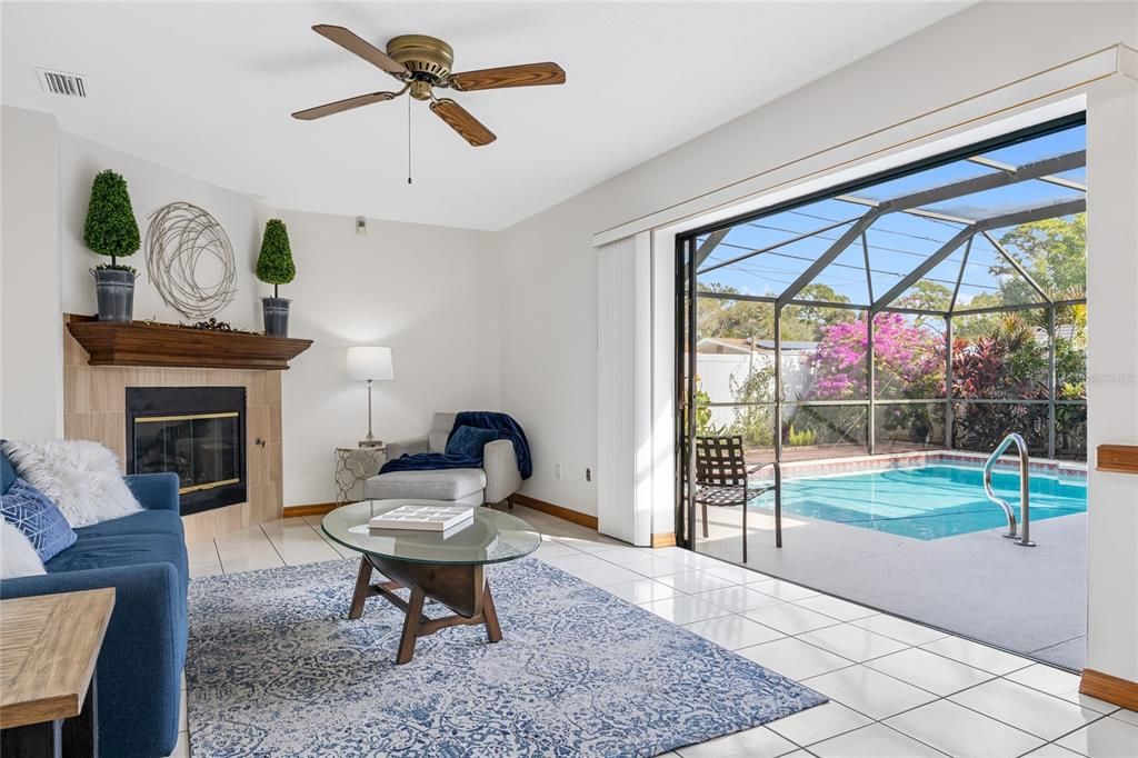 Pocketing sliding doors from the Family Room provide direct access to the lanai and pool.