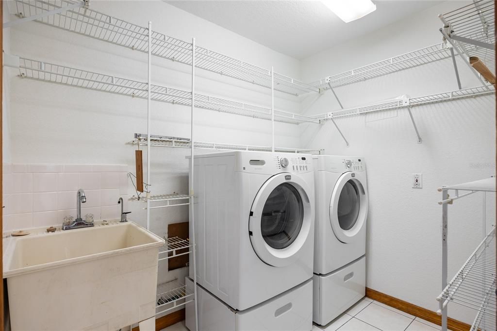 You will love this spacious inside laundry room!