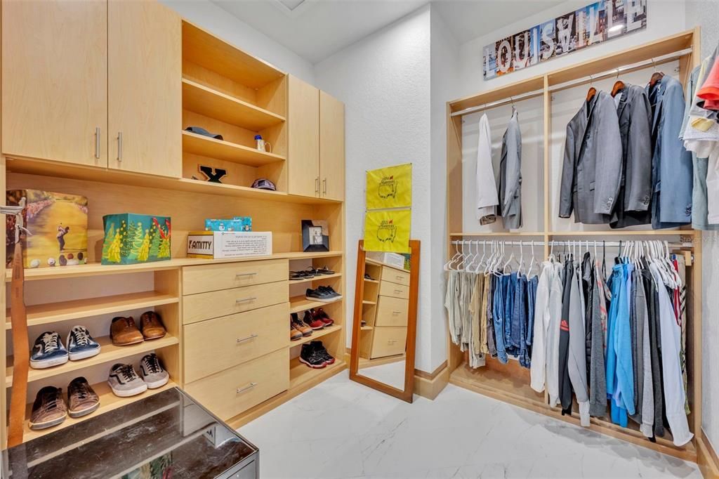 Primary bedroom closet for him