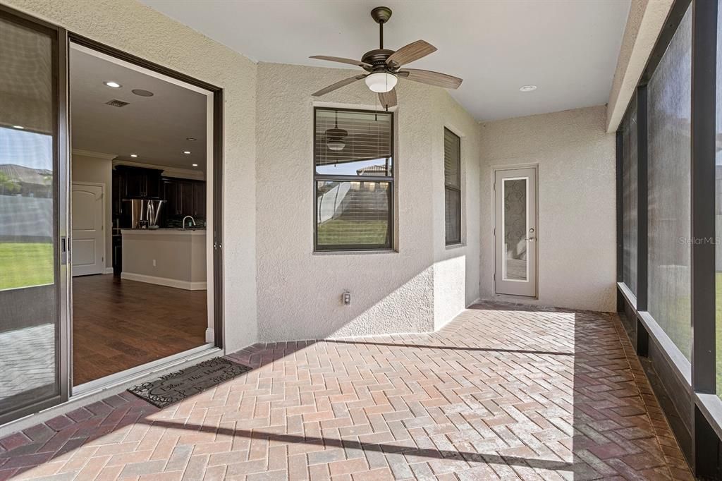 Oversized screened-in back patio