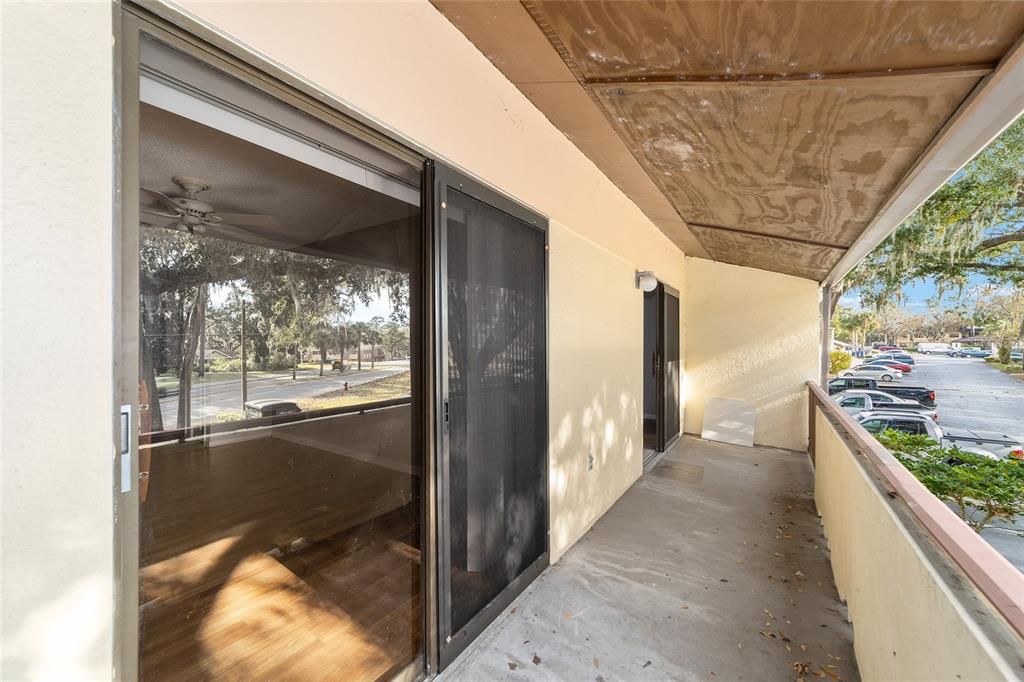 balcony from living room to primary bedroom