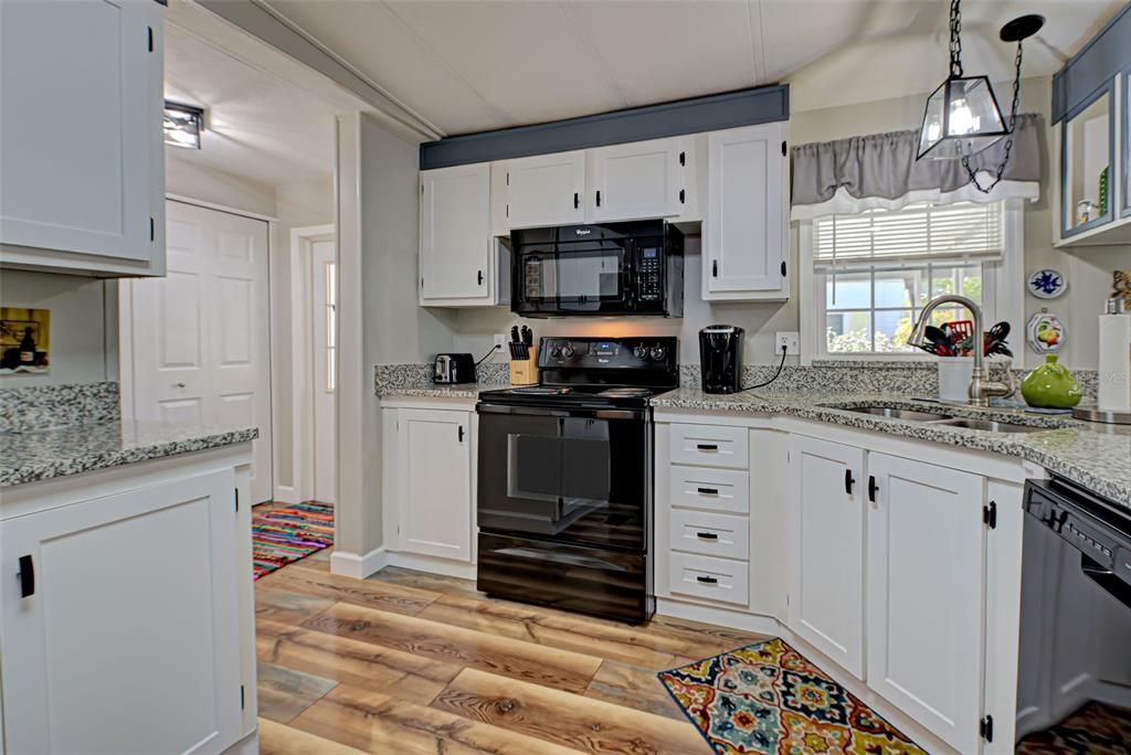 TASTEFULLY RENOVATED KITCHEN WITH GREAT DETAIL.