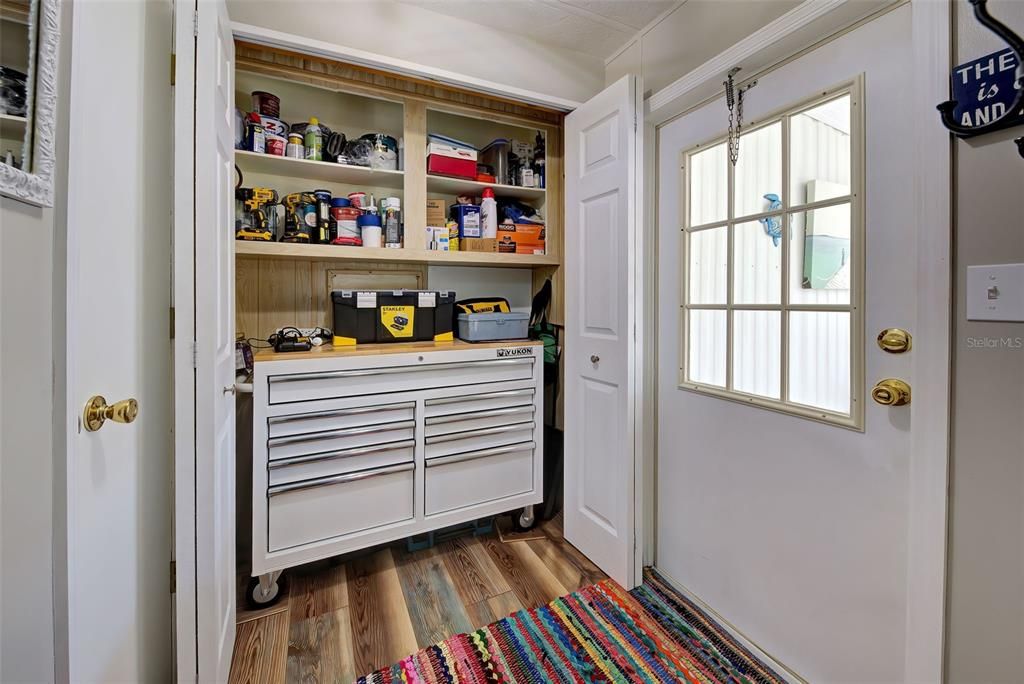 BUILT IN PANTRY - CURRENT USE FOR WORKBENCH AND TOOLS. THE WORKBENCH STAYS - TOOLS DO NOT.