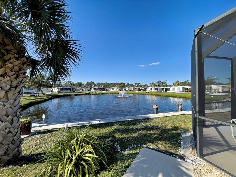 LOVELY SETTING OVERLOOKING THE LAKE WITH FOUNTAIN.