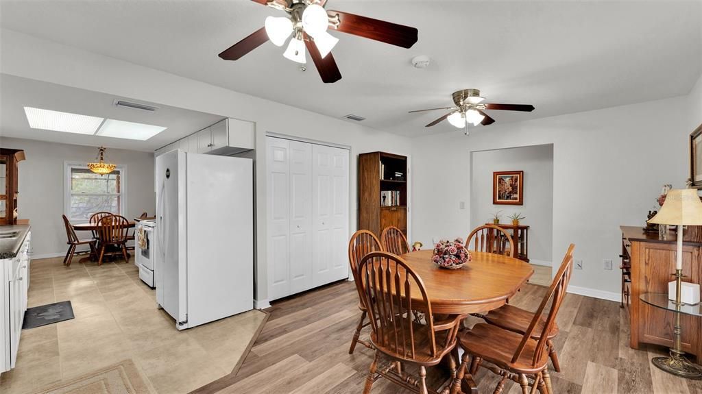 Dining looking into entryway and kitchen