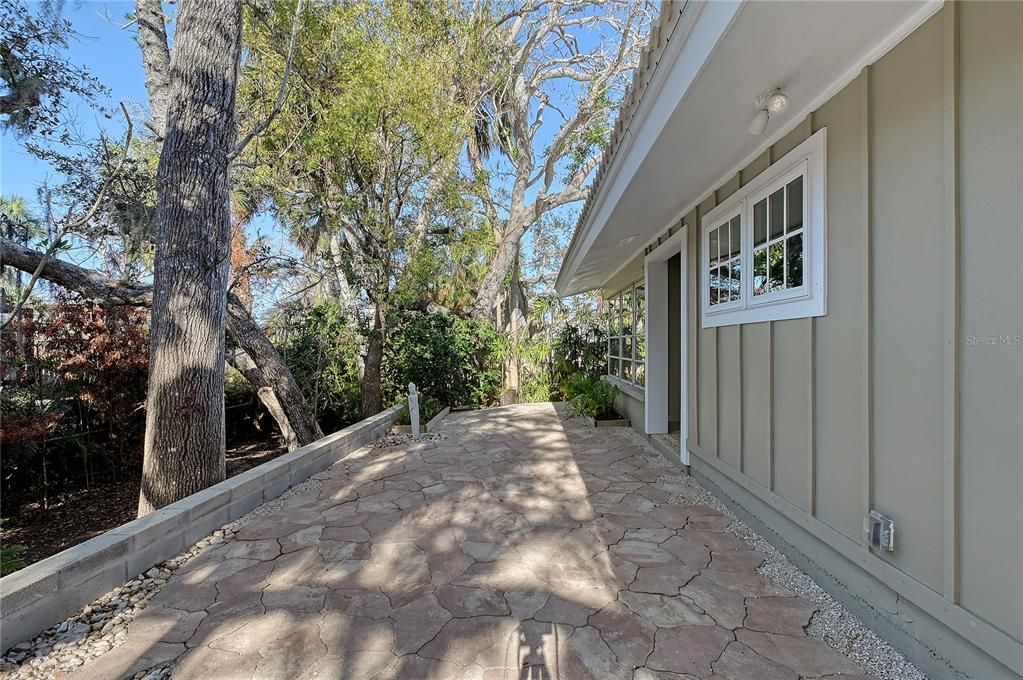 Backyard Facing North - Retaining Wall with Yard Below, Paver Patio