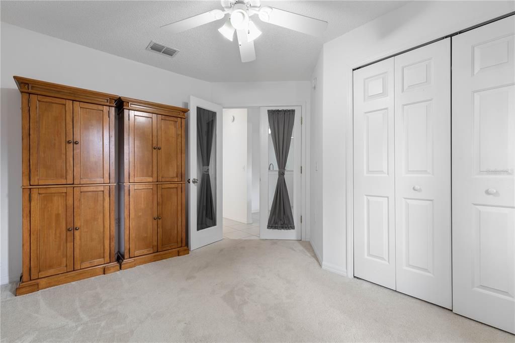 Bedroom 2 with French Doors and Closet