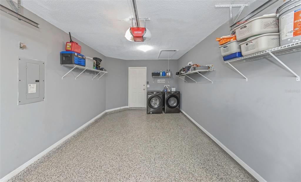 Garage with new Shelving and Freshly expoxied flooring