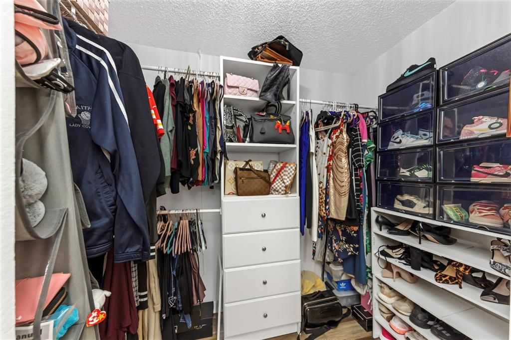 Walk in Closet with Built In Shelving