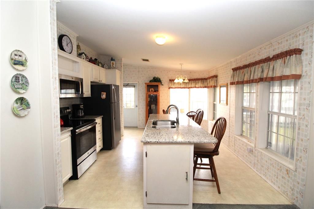 Beautiful Kitchen with granite countertops.... all appliances convey..