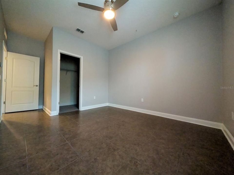 Bedroom 4 with walk-in closet view