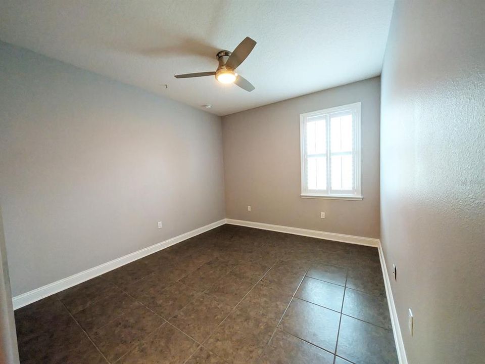 Bedroom 3 with walk-in closet view