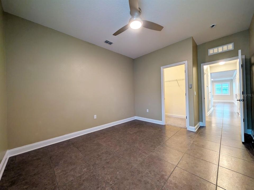 Bedroom 2 with walk-in closet view