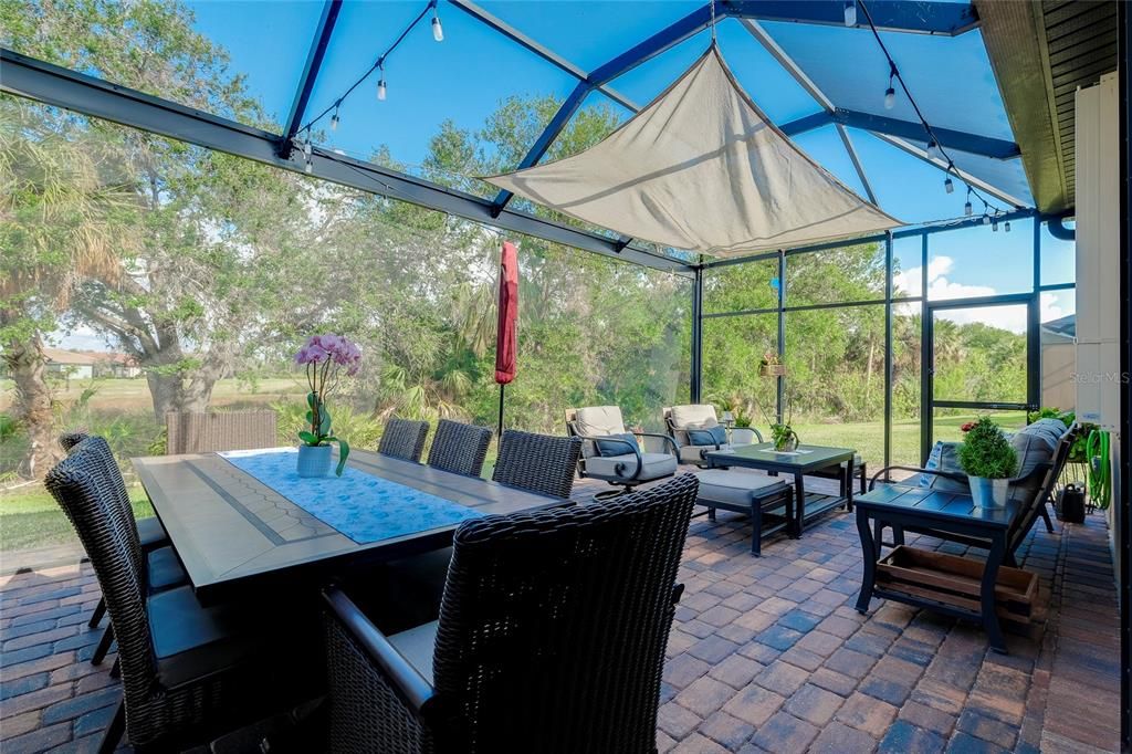 Extended Lanai with pavers and nature view