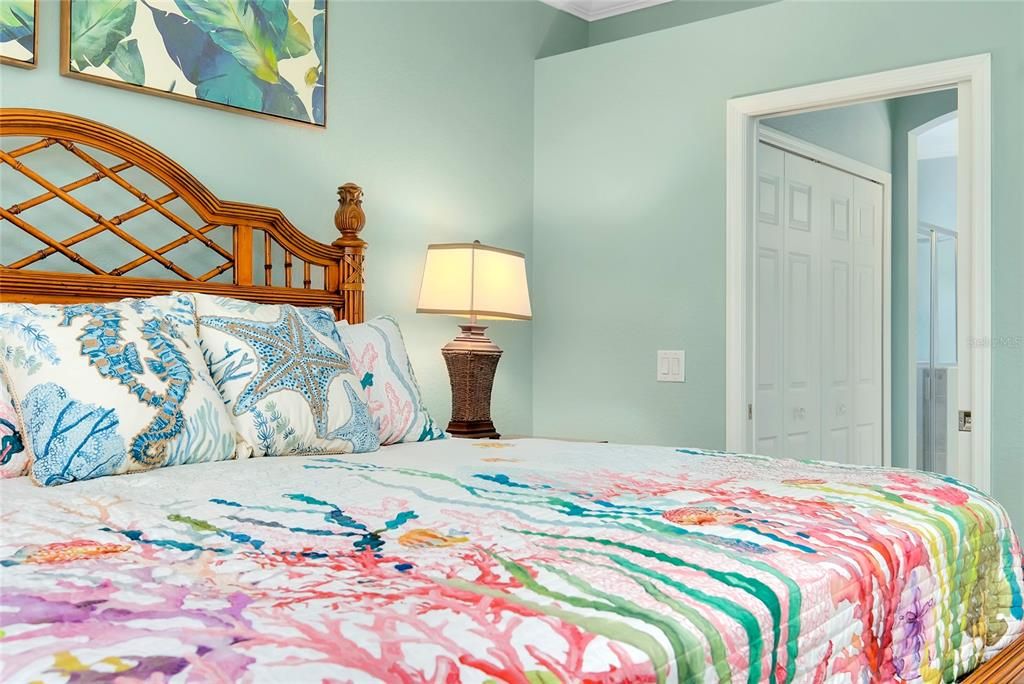 Primary Bedroom w/tile flooring w/Lanai Access