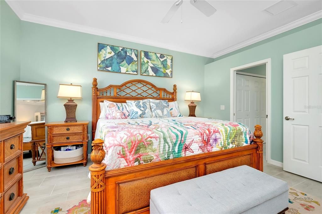 Primary Bedroom w/tile flooring w/Lanai Access