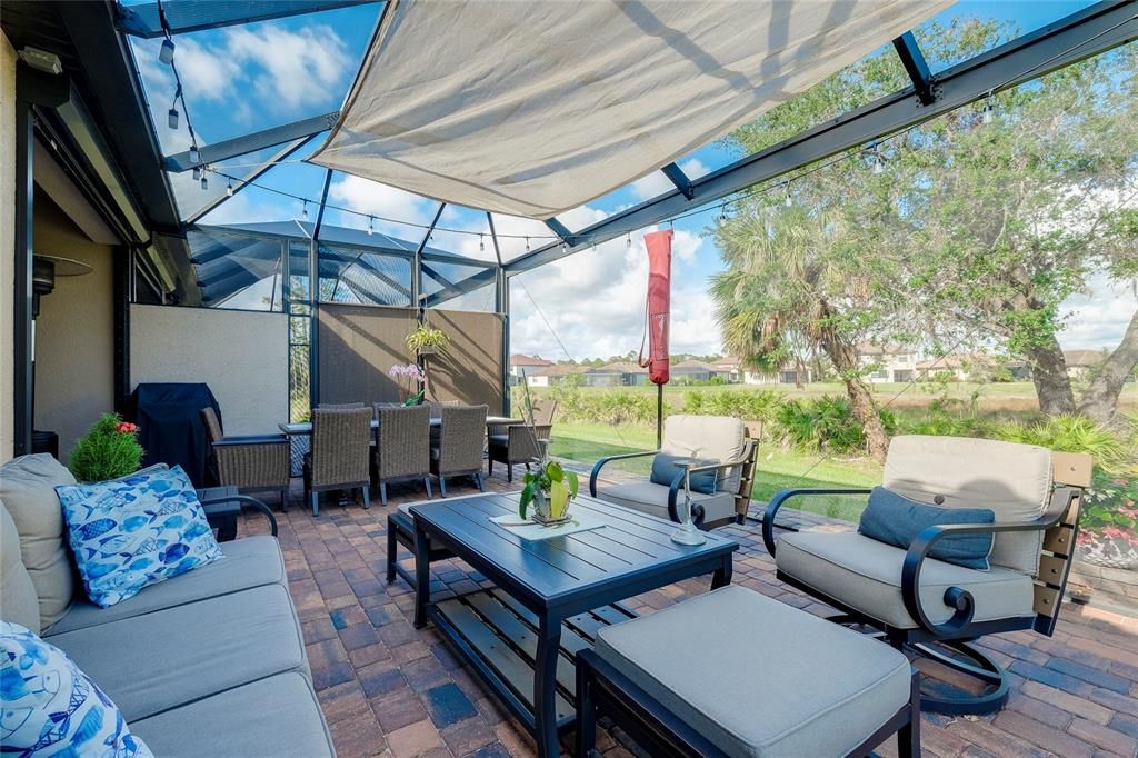 Extended Lanai with pavers and nature view