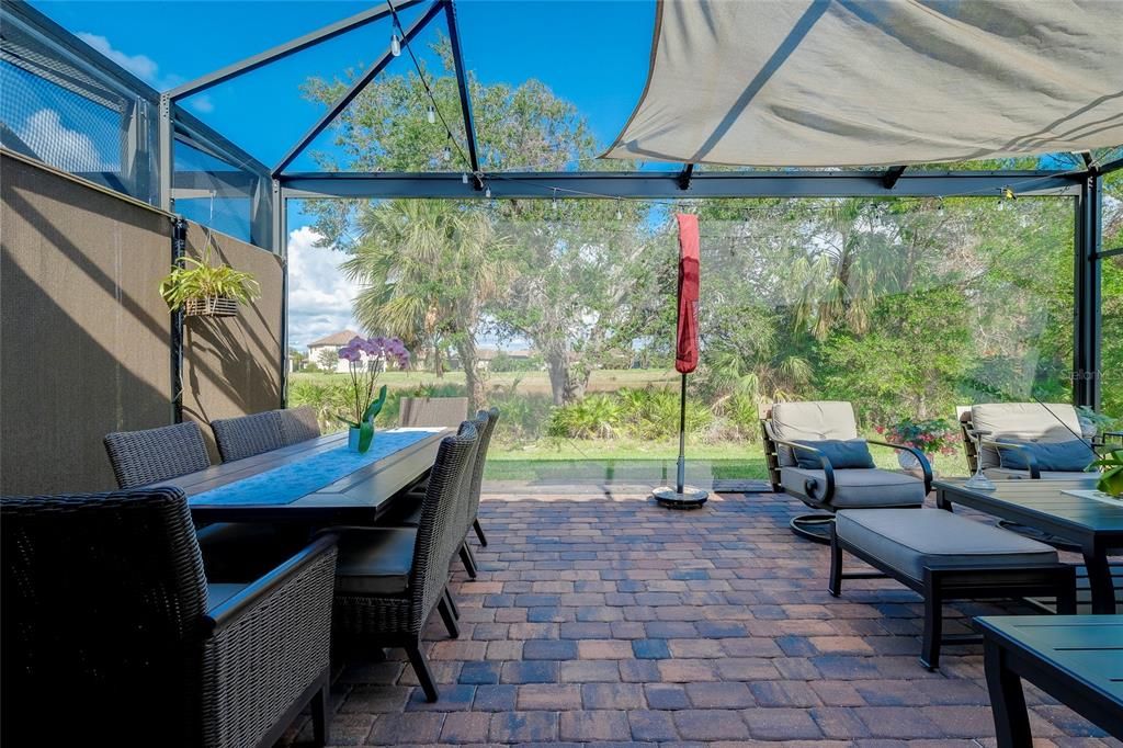 Extended Lanai with pavers and nature view